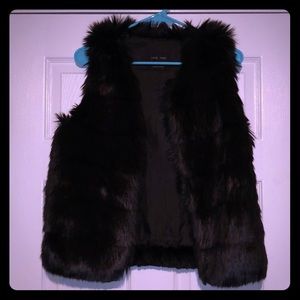 Black faux fur vest